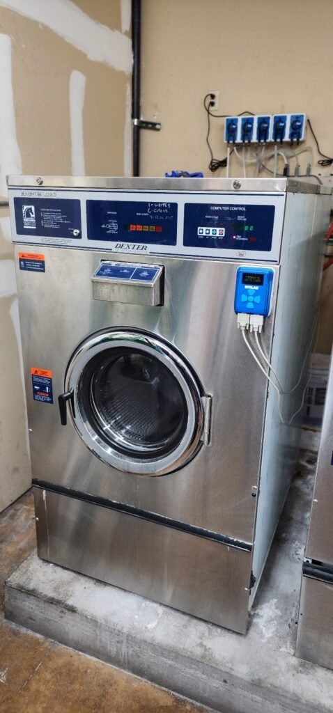 Commercial Dexter washing machine with chemical injection system, serviced by Ice Age Commercial in Tempe AZ